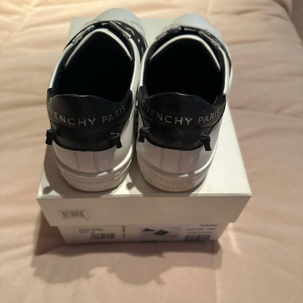 Leather white and black slip on unisex GIVENCHY kid shoes.